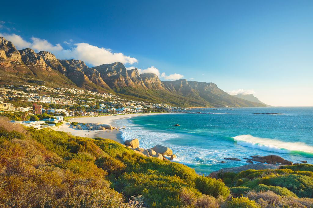 A scenic view of Table Mountain and the coastline of Cape Town, South Africa.