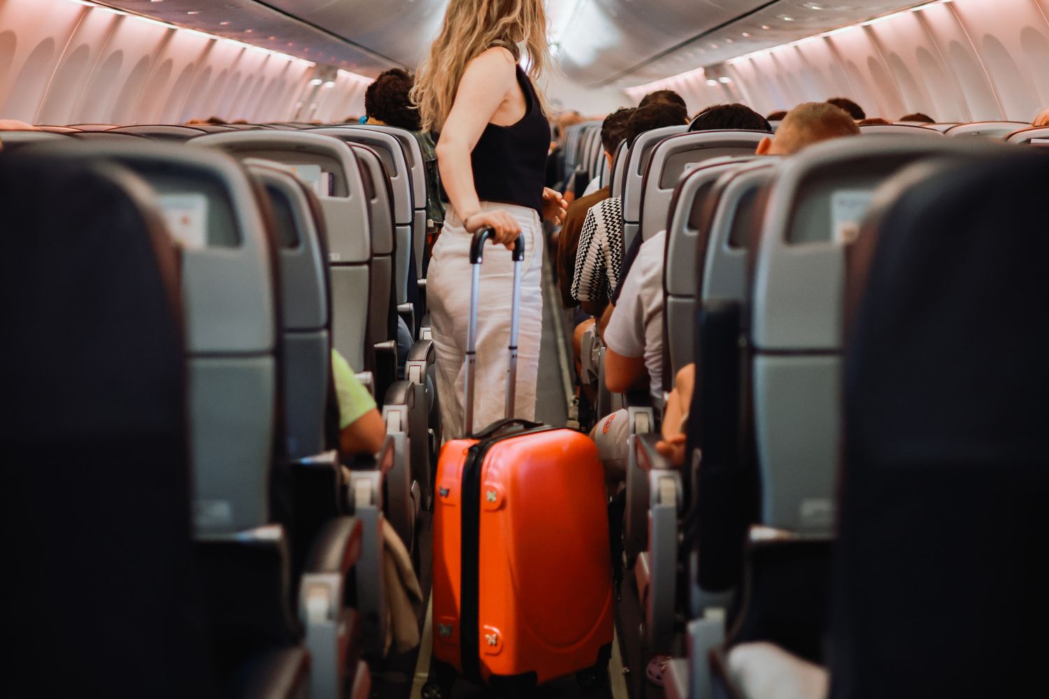 Perfect Overhead Bin Storage: The Wheels-First Rule