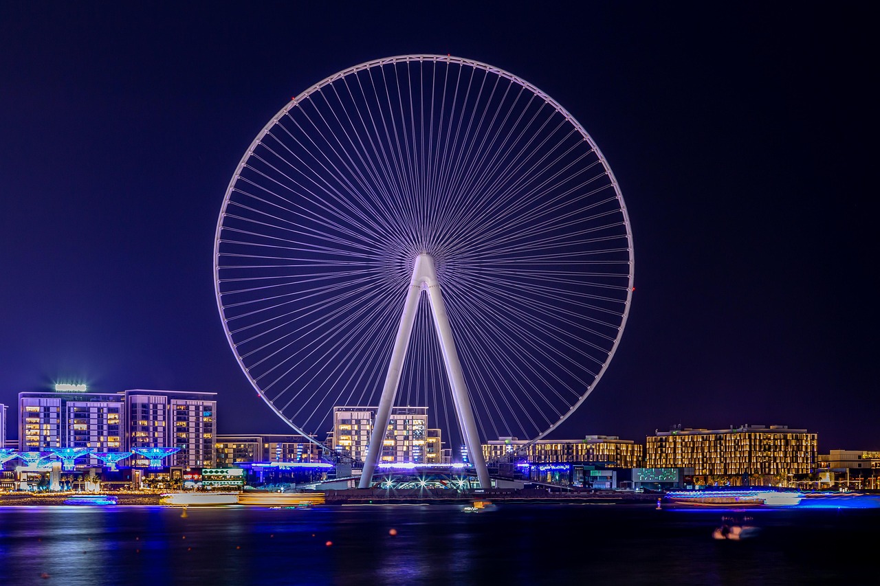The High Roller observation wheel illuminated at night in Las Vegas.