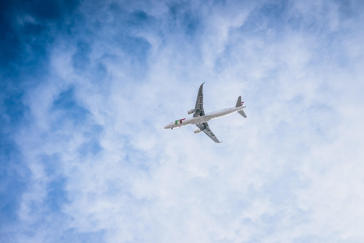 A Turkish Airlines aircraft flying above the clouds