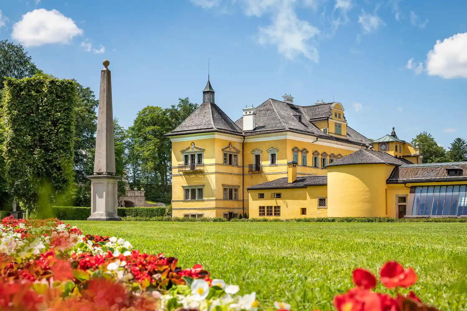 Hellbrunn Palace gardens showing the architectural style and landscaped grounds.