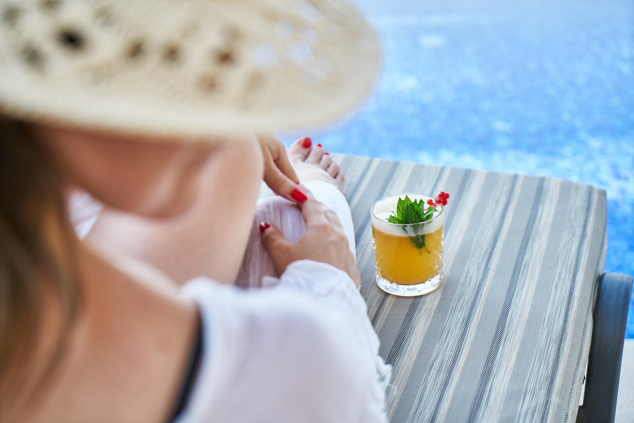 Infinity pool overlooking the blue sea in Taormina, Sicily.