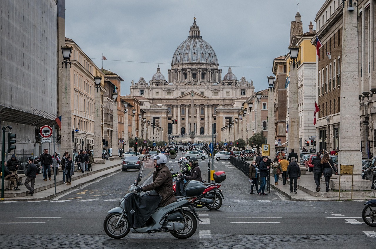 A peaceful view of a Roman piazza with few tourists during a clear winter day.