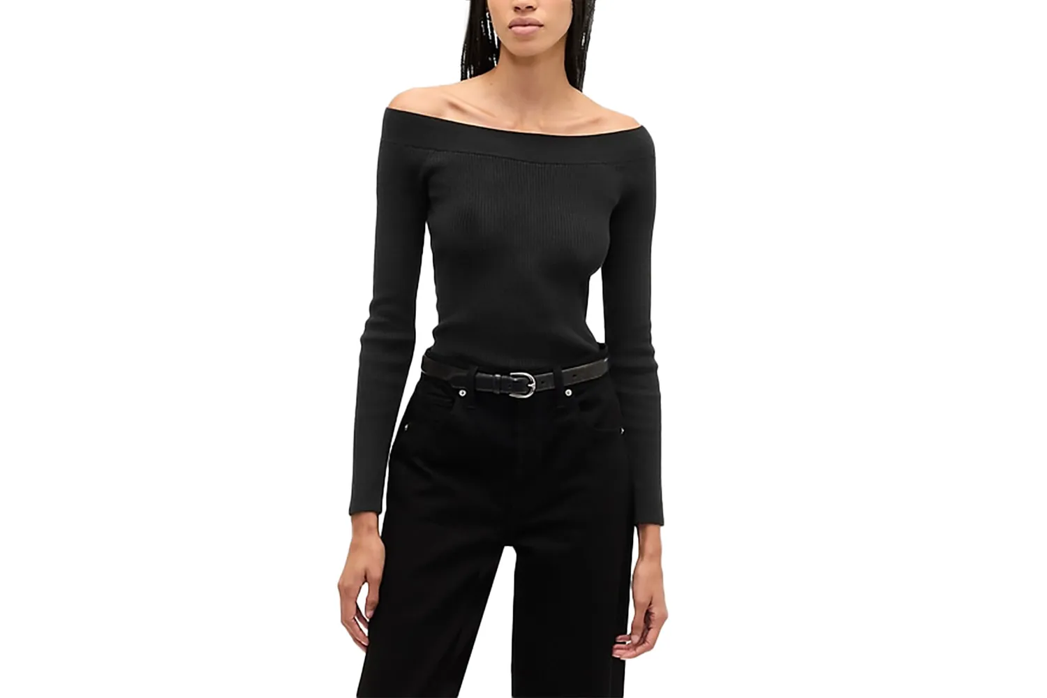 A woman wearing a grey ribbed off-the-shoulder sweater from GAP.