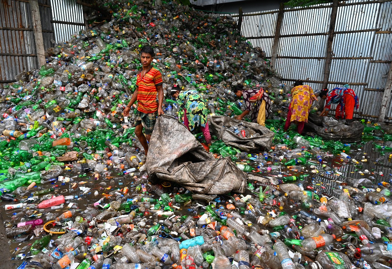 A floating barrier in a river designed to catch plastic waste before it reaches the sea.