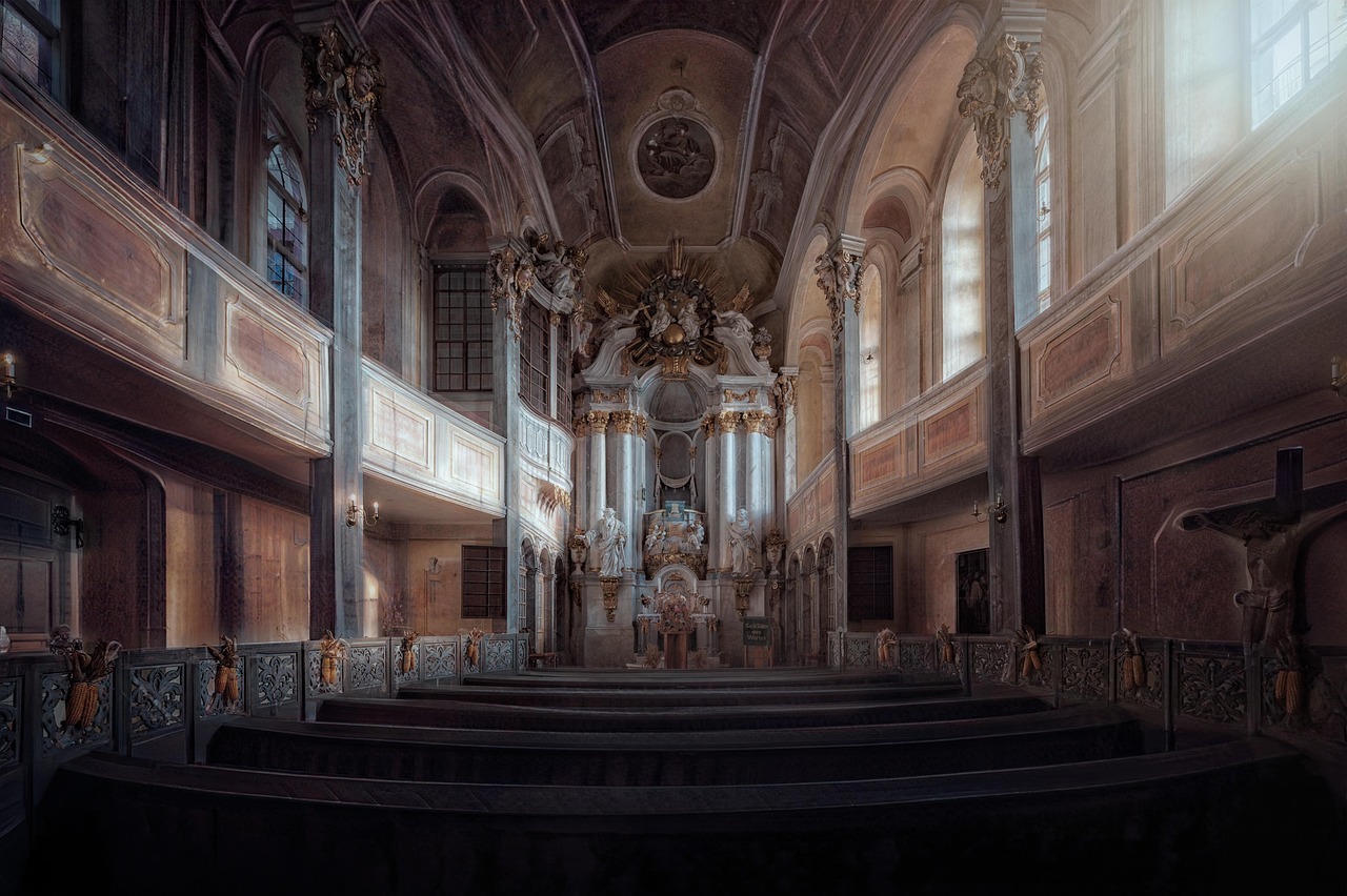 Intricate Renaissance frescoes on a vaulted cathedral ceiling