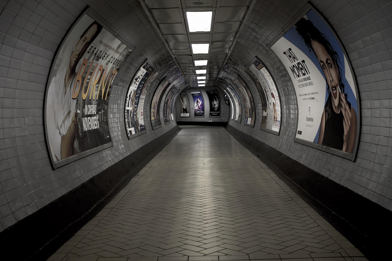 An iconic London Underground roundel sign at a station entrance.