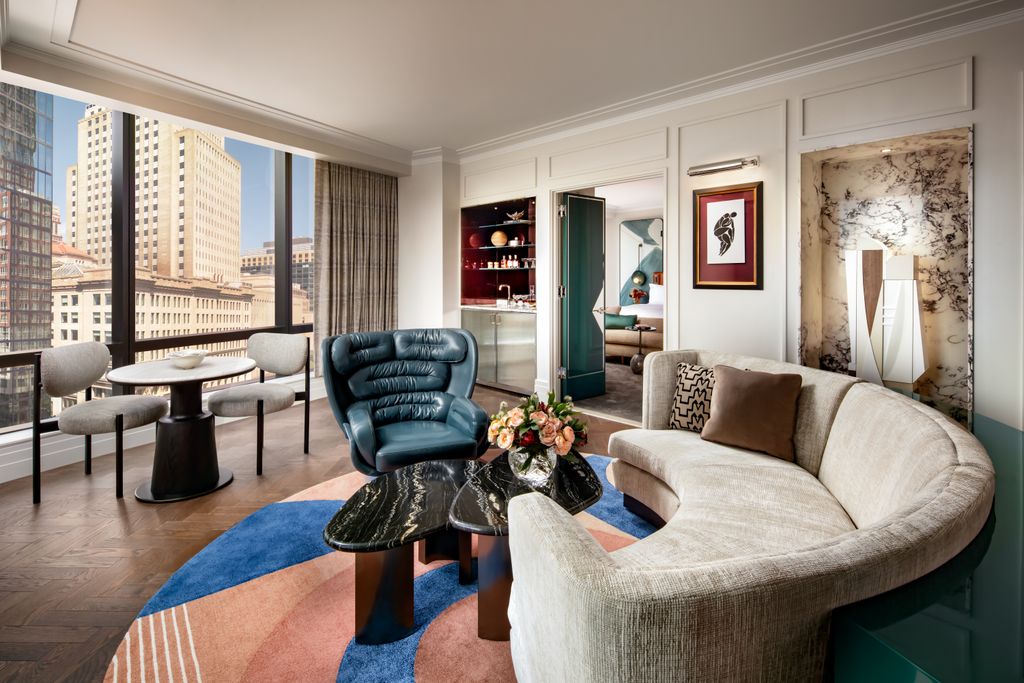 Elegant and private king bedroom suite at Raffles Boston with contemporary decor.