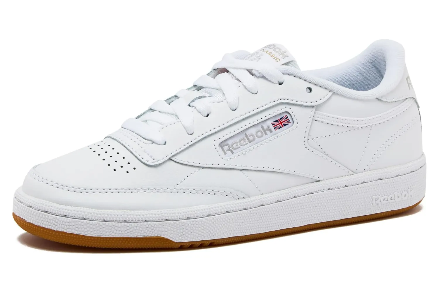 Classic all-white Reebok Club C 85 leather sneakers.