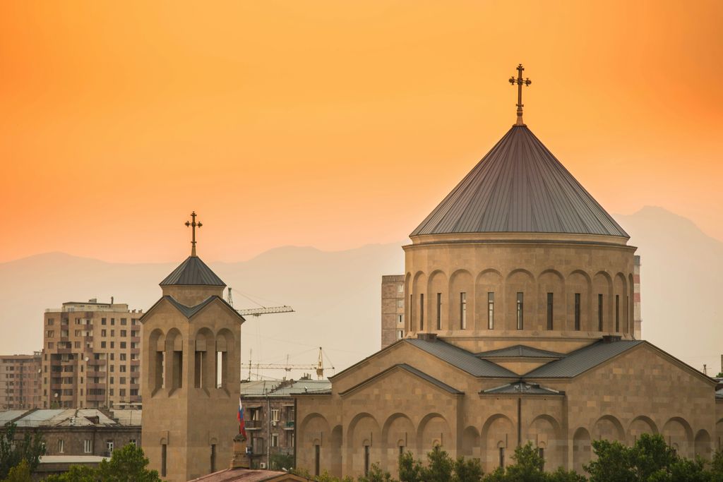 The pink-hued stone architecture of Yerevan, Armenia, with Mount Ararat in the background.