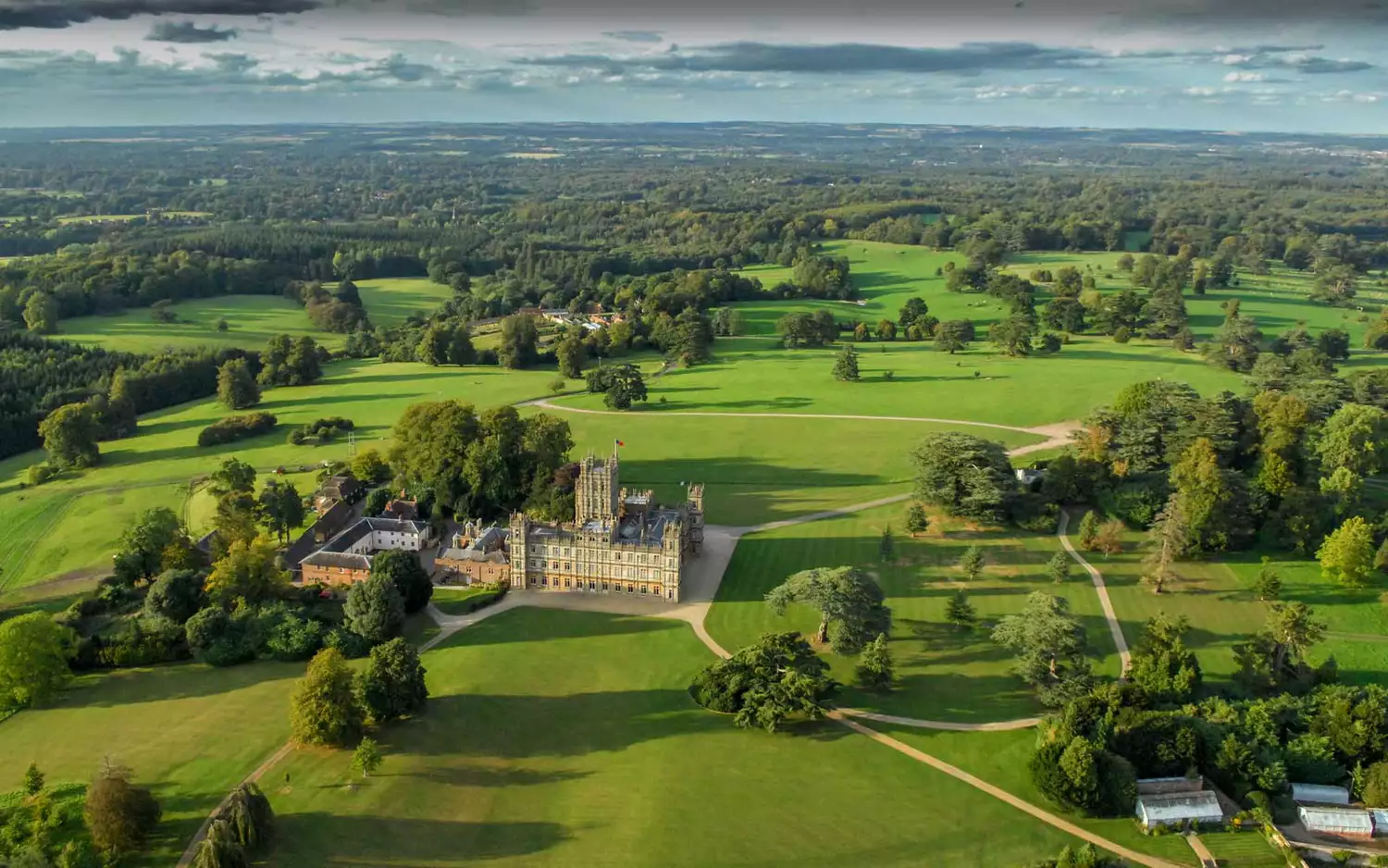 An aerial view of the Victorian Highclere Castle, known to many as the setting for Downton Abbey.