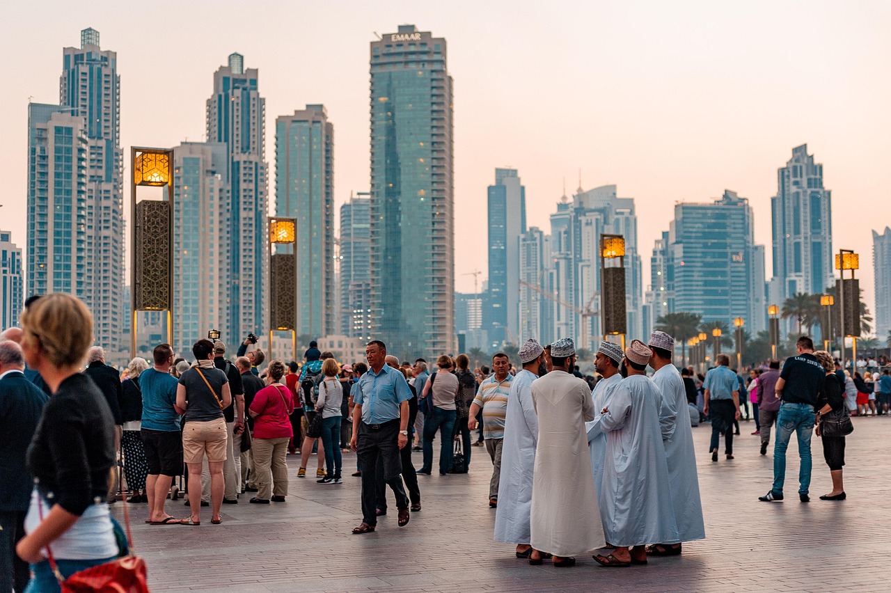 Traditional wooden abra boat carrying passengers across Dubai Creek.