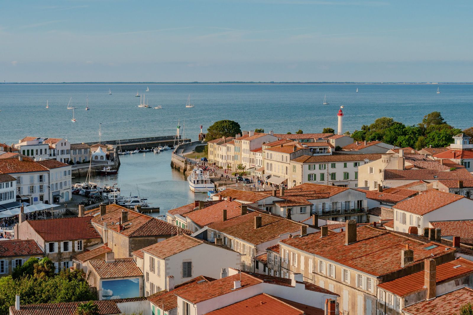 Classic waterfront buildings with terracotta roofs in Saint-Martin-de-Ré.