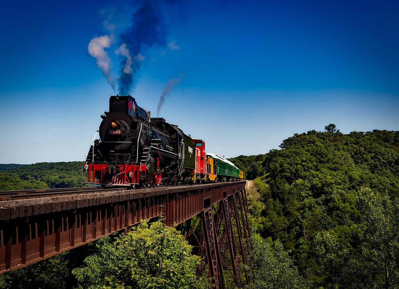 Looking through a train window at a blurred landscape, symbolizing the transition of travel.
