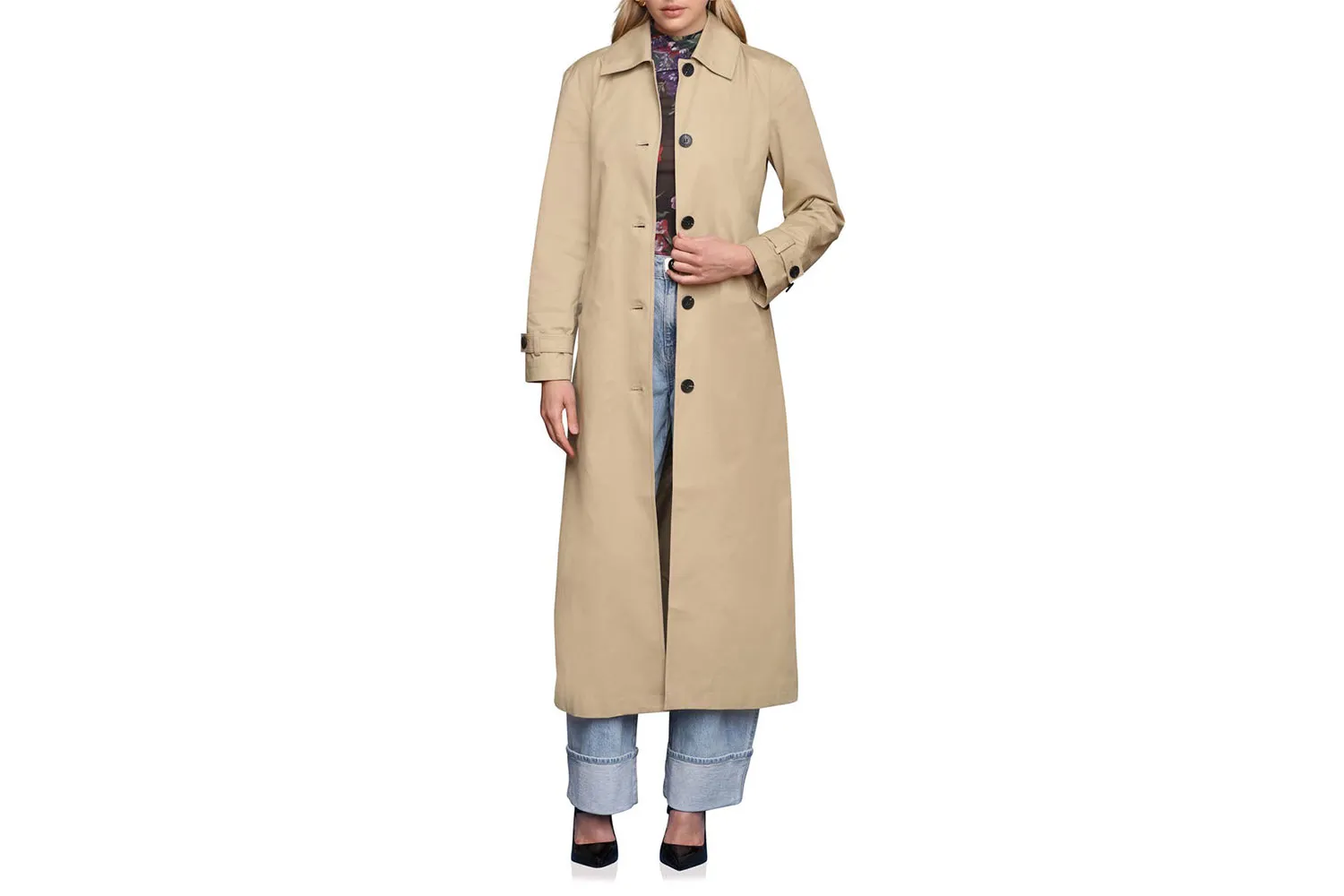 A belted longline trench coat in a classic tan color.
