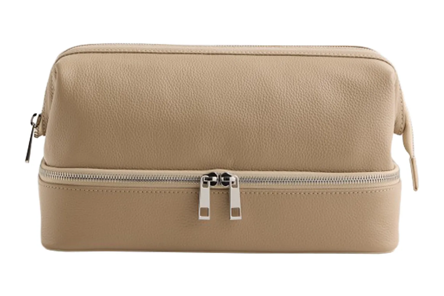 The Quince Italian Leather Dual Compartment Toiletry Bag in a neutral setting.
