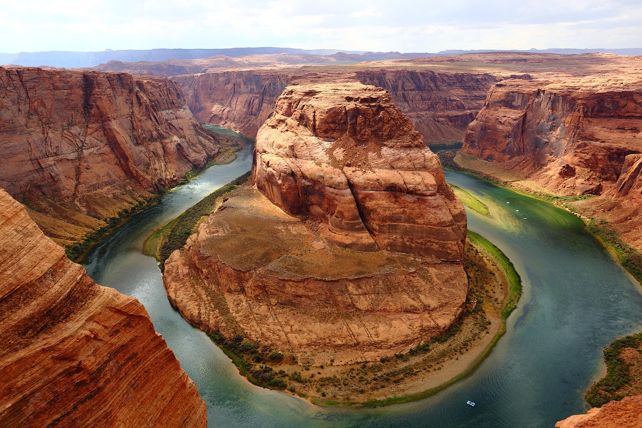A winding hiking trail descending into the deep canyons of Arizona.