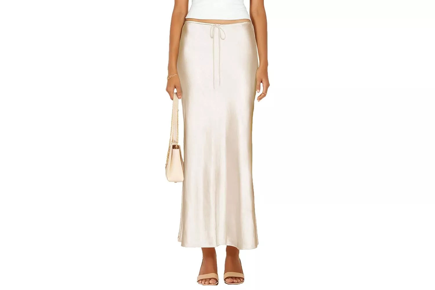 A flowing satin midi skirt in a neutral tone.