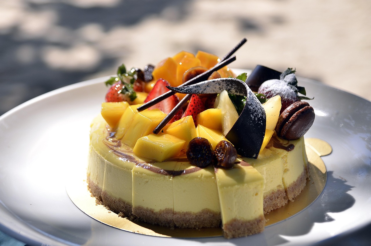 A meticulously crafted modern pastry with layered textures and fine garnishes.