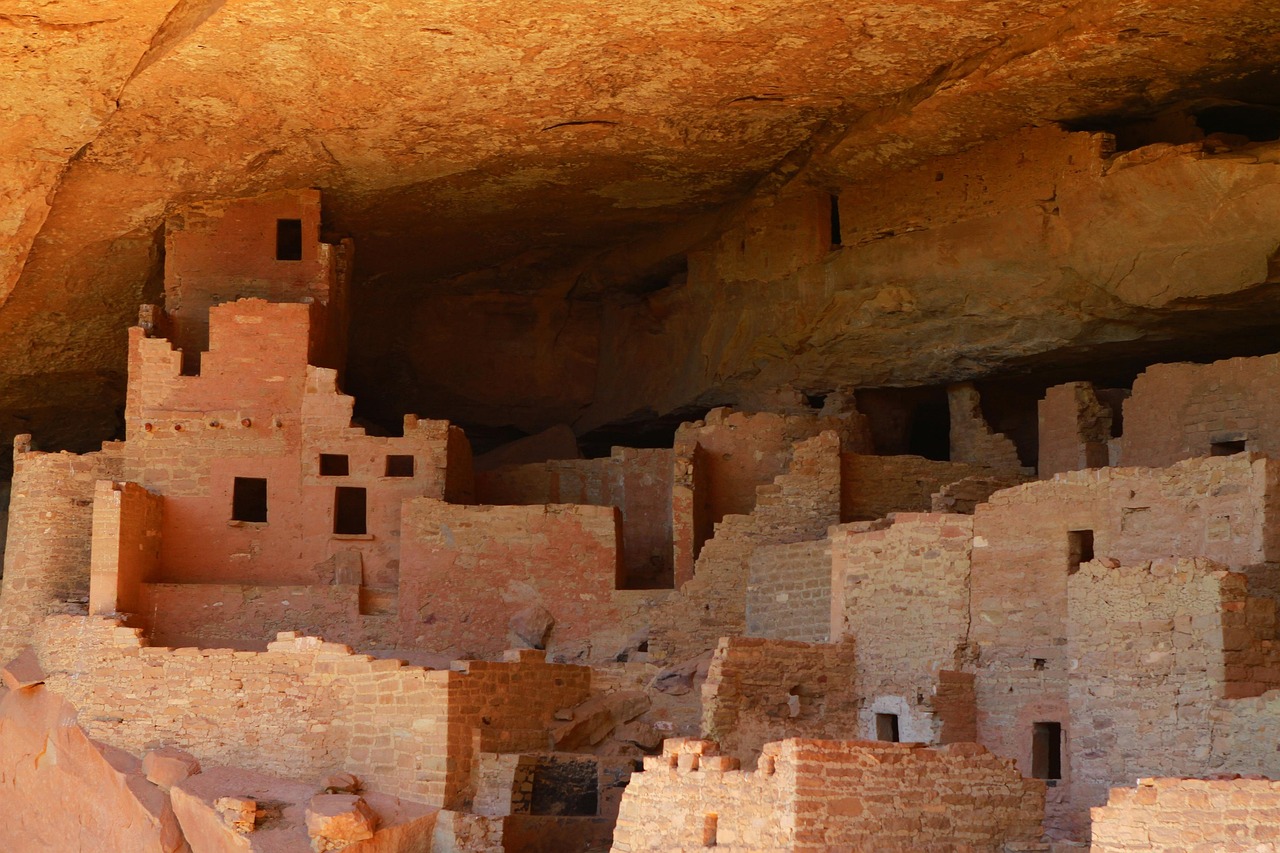 Ancient stone ruins built into a cliff side at Mesa Verde.