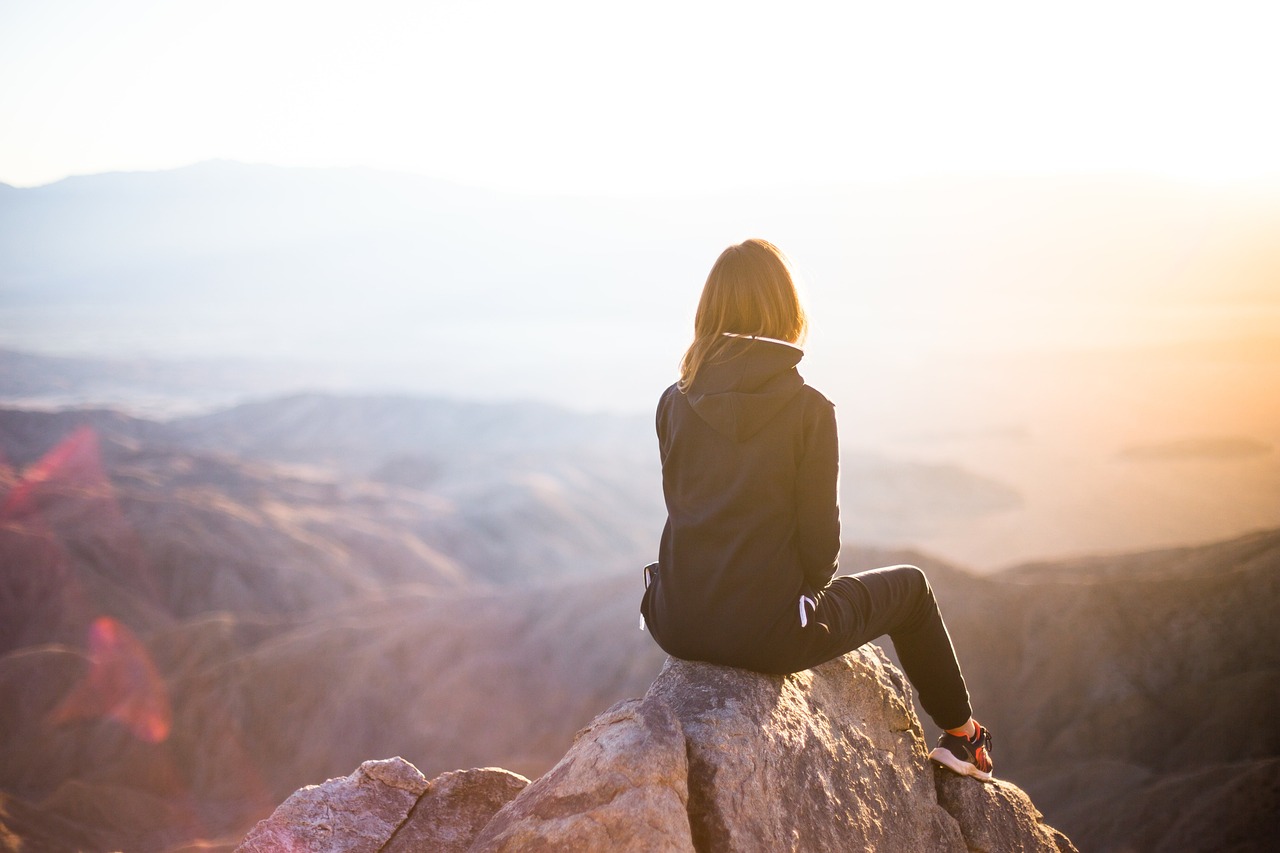 An empowered woman looking out at the horizon