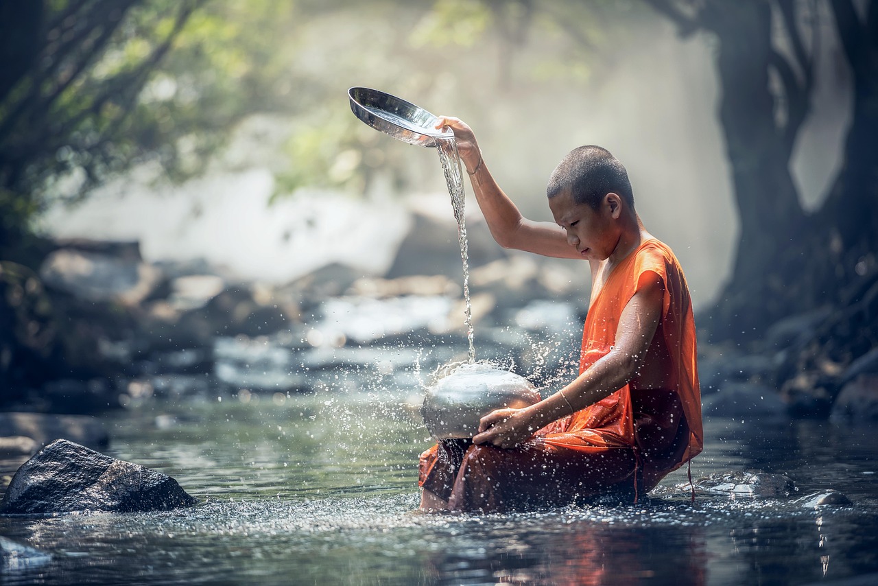 People participating in a traditional purification ritual at Tirta Empul Holy Water Temple.