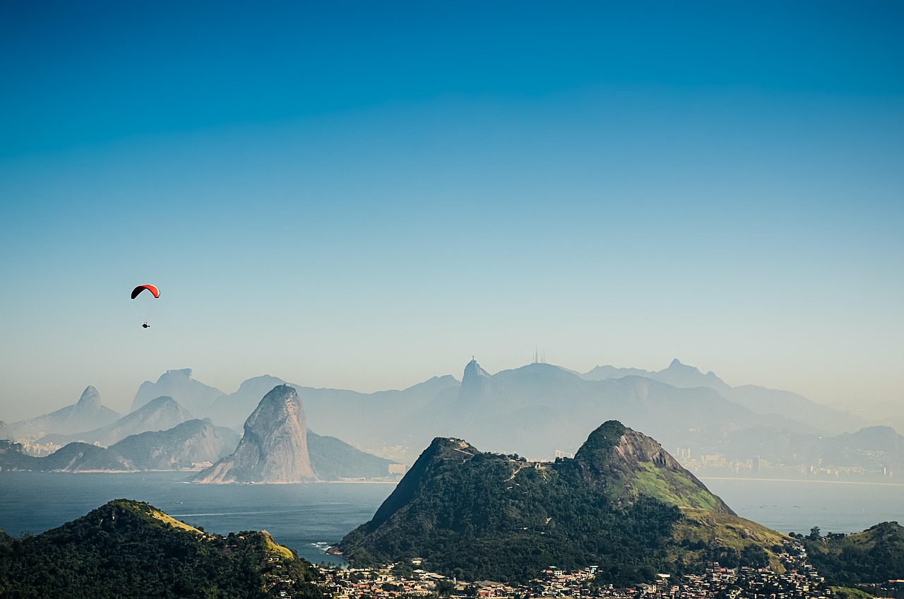 Looking down from Sugarloaf Mountain at the city and sea at dusk.