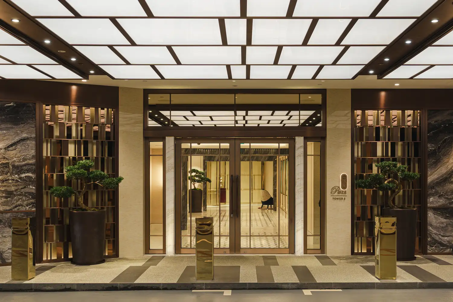 The grand double-door entrance to the Paiza Collection at Marina Bay Sands.