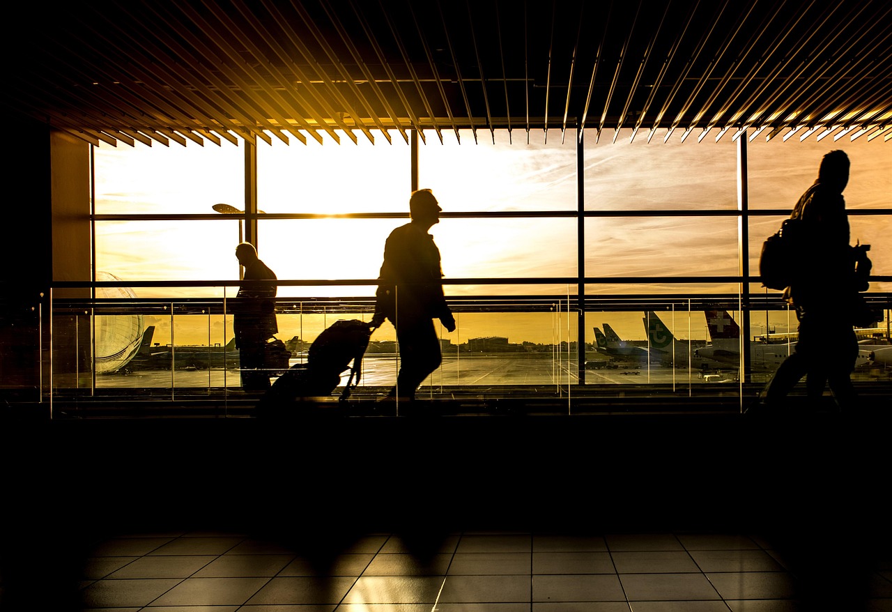 Modern interior of Dubai International Airport with passengers