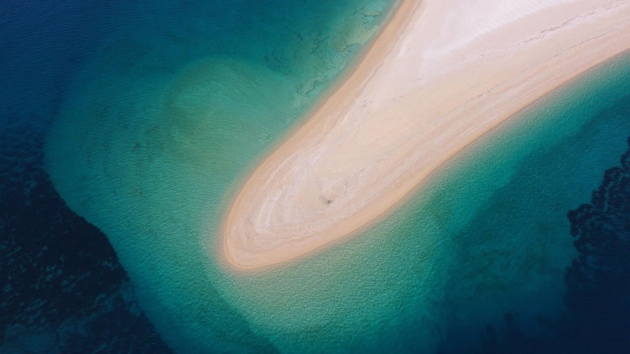 Aerial view of the unique V-shaped Zlatni Rat beach in Bol, Croatia.
