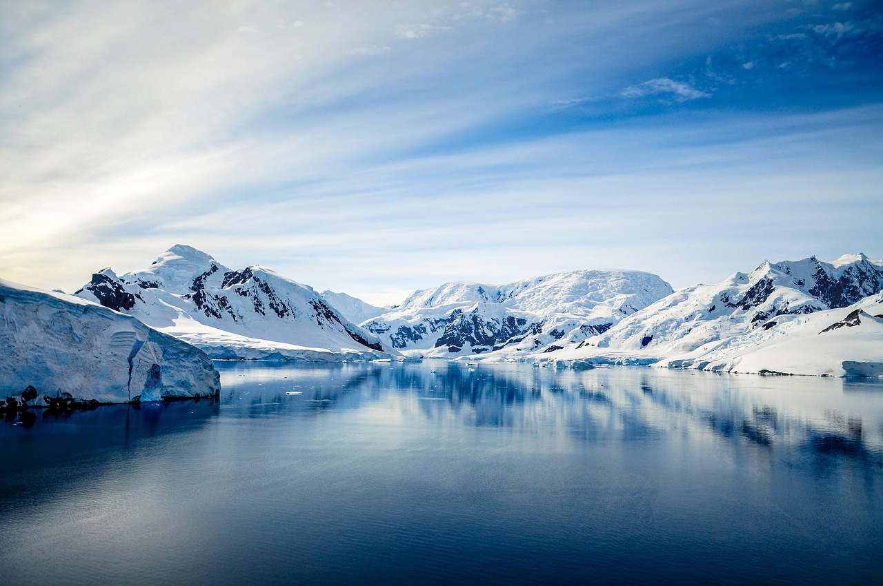 Pristine white glaciers and mountains in Antarctica.