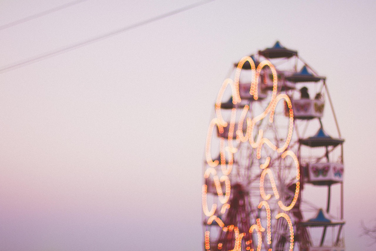 The vintage ferris wheel at Tibidabo Amusement Park overlooking the city of Barcelona.