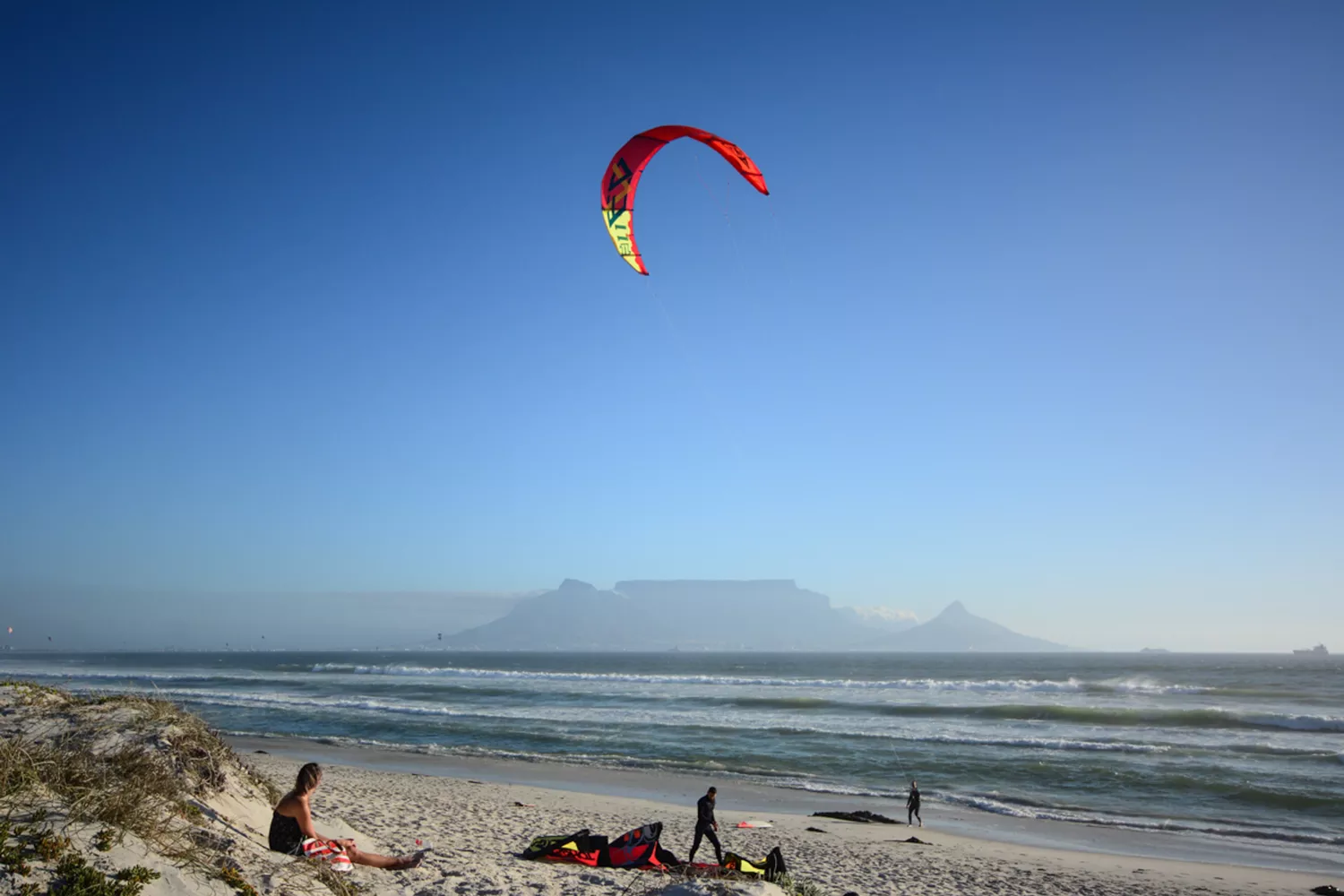 A bright and sunny beach scene along the South African coast.