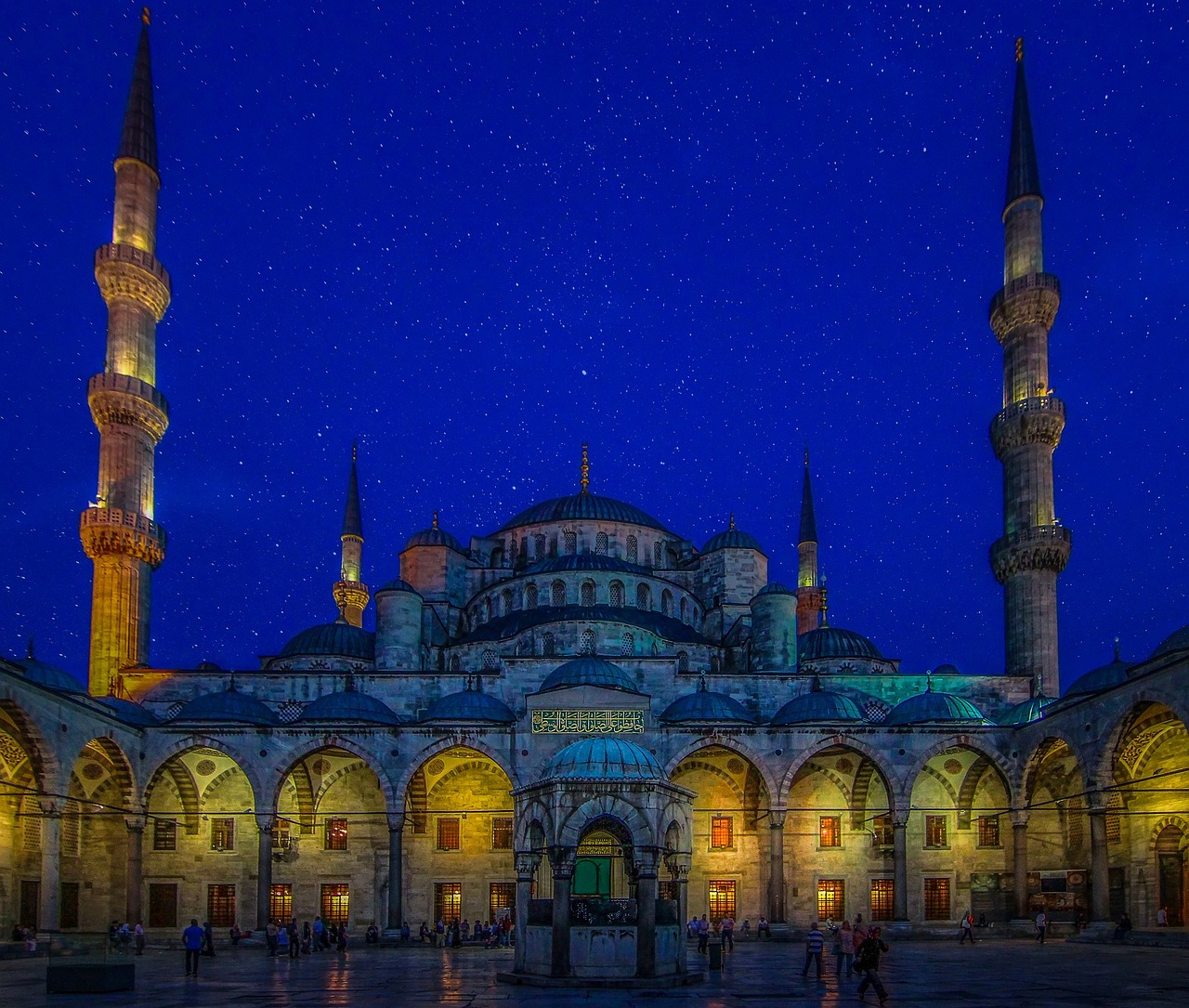 The intricate blue tiles and domes inside the Sultan Ahmed Mosque