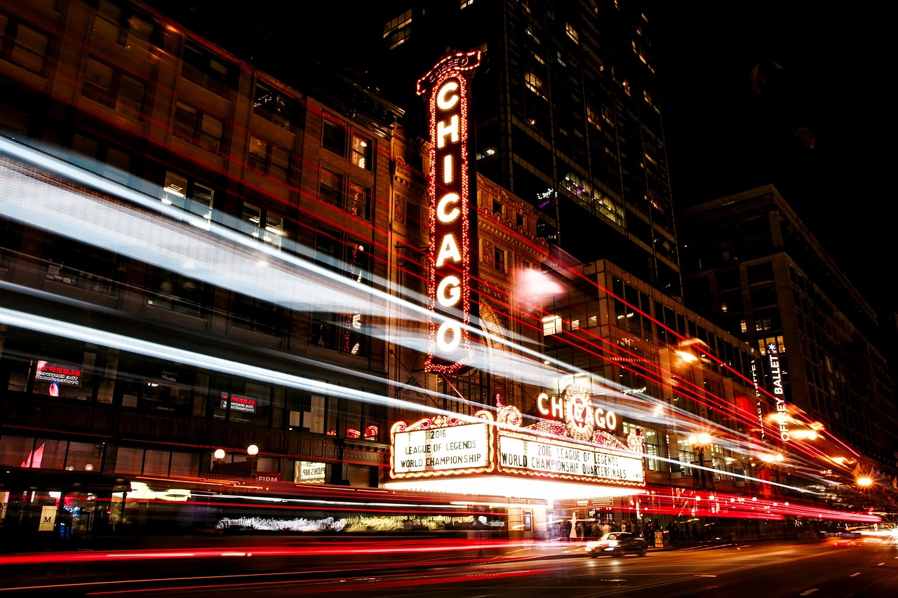 A vibrant street view of the Magnificent Mile in Chicago showing upscale architecture.