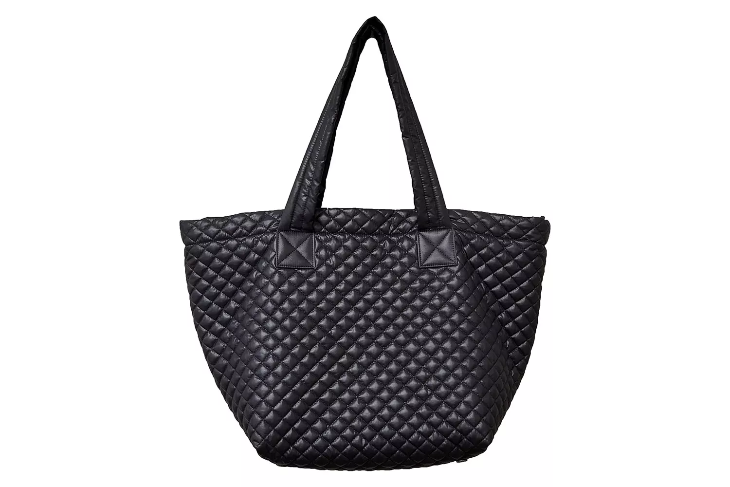 A large quilted tote bag with a zipper and luggage sleeve.