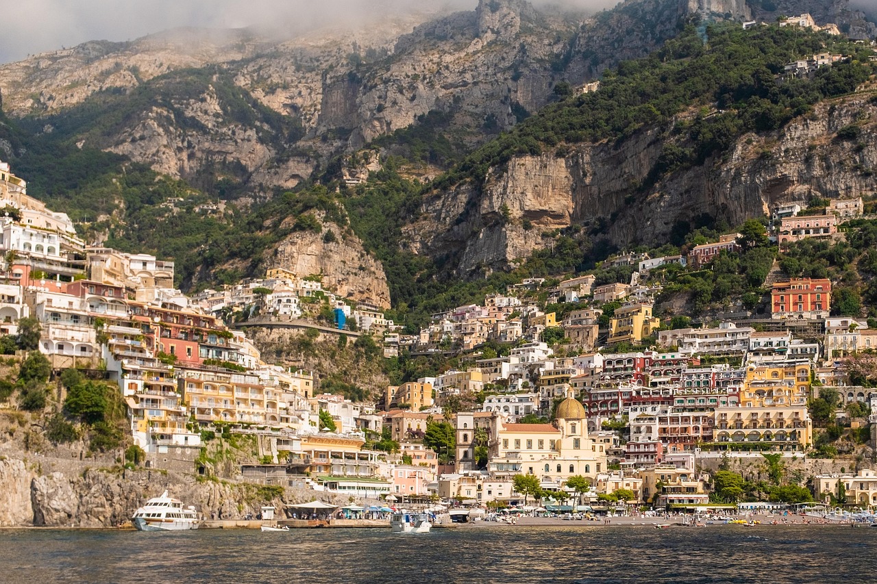The colorful houses of Positano built into the cliffs overlooking the Mediterranean Sea.