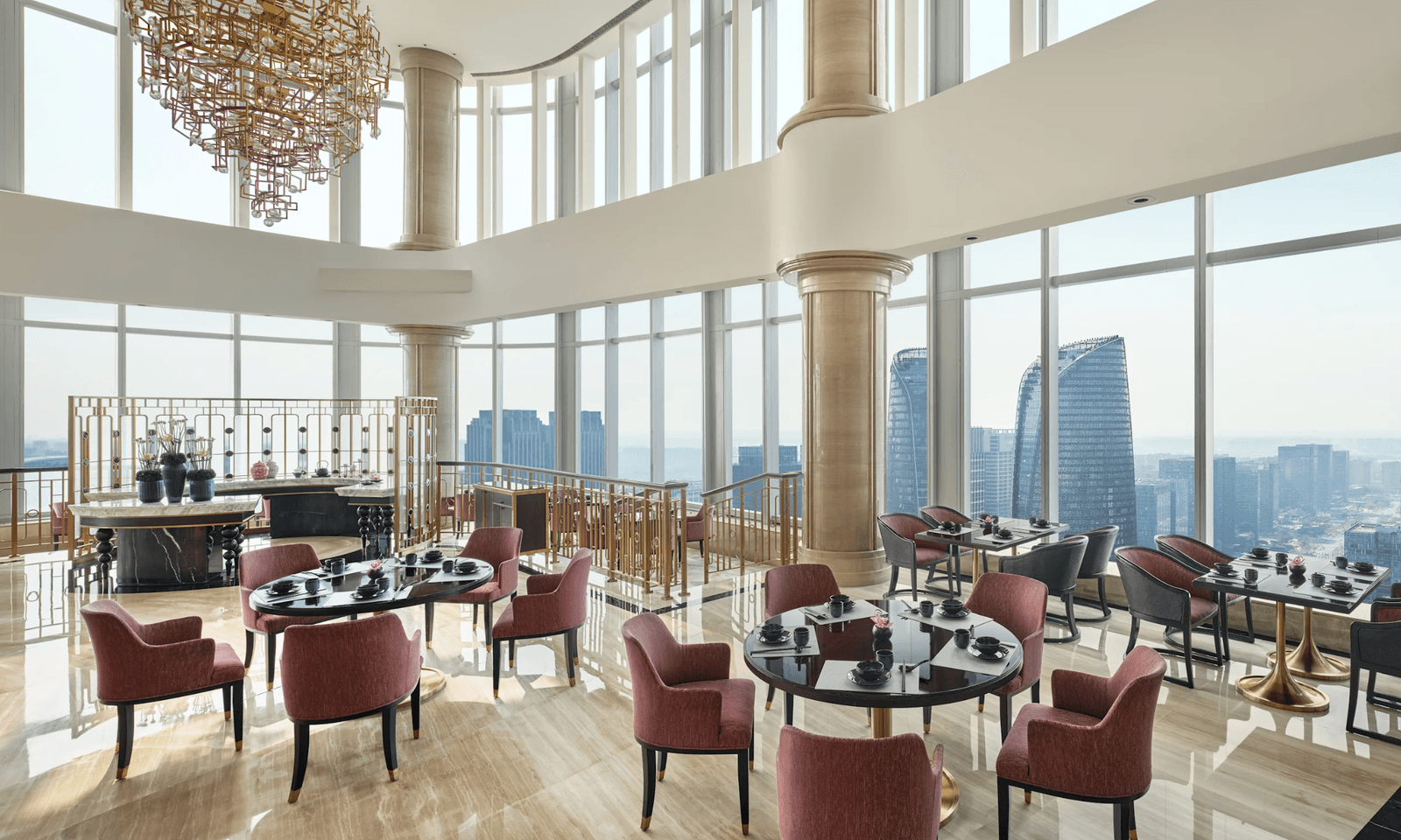 An elegant indoor dining room with designer furniture, representative of high-end Chengdu gastronomy.