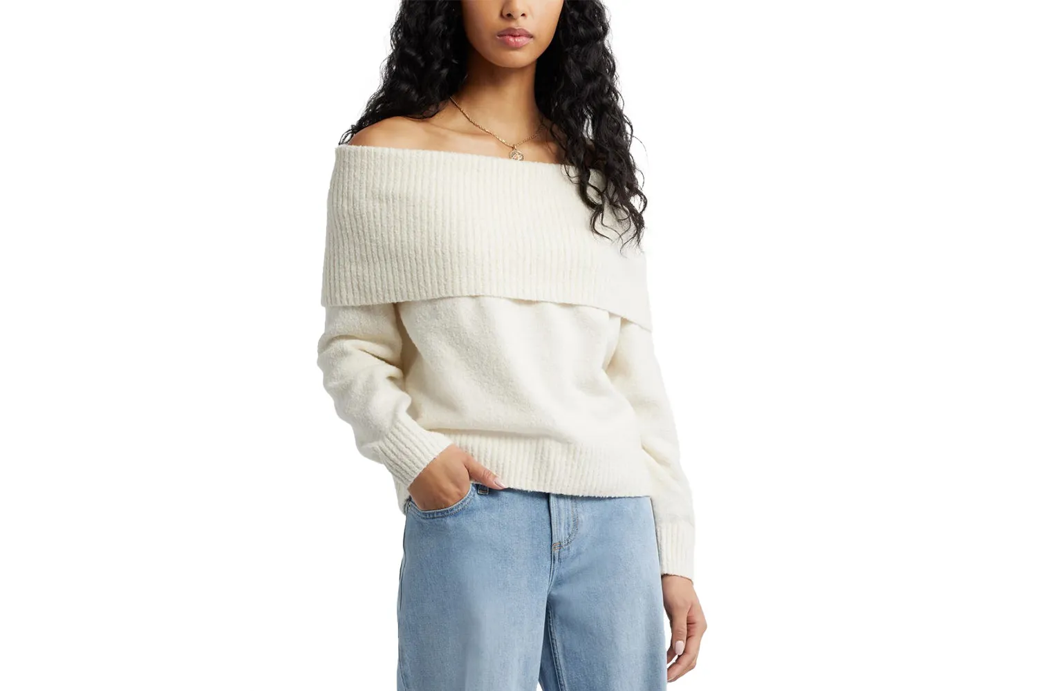 Close-up of a soft boucle textured off-the-shoulder sweater.